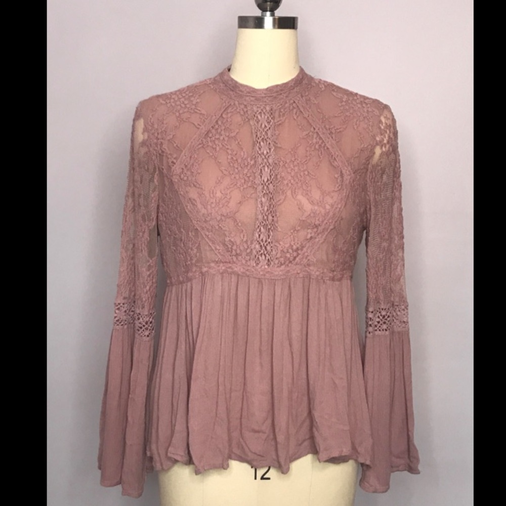 Pink lacy high neck top.